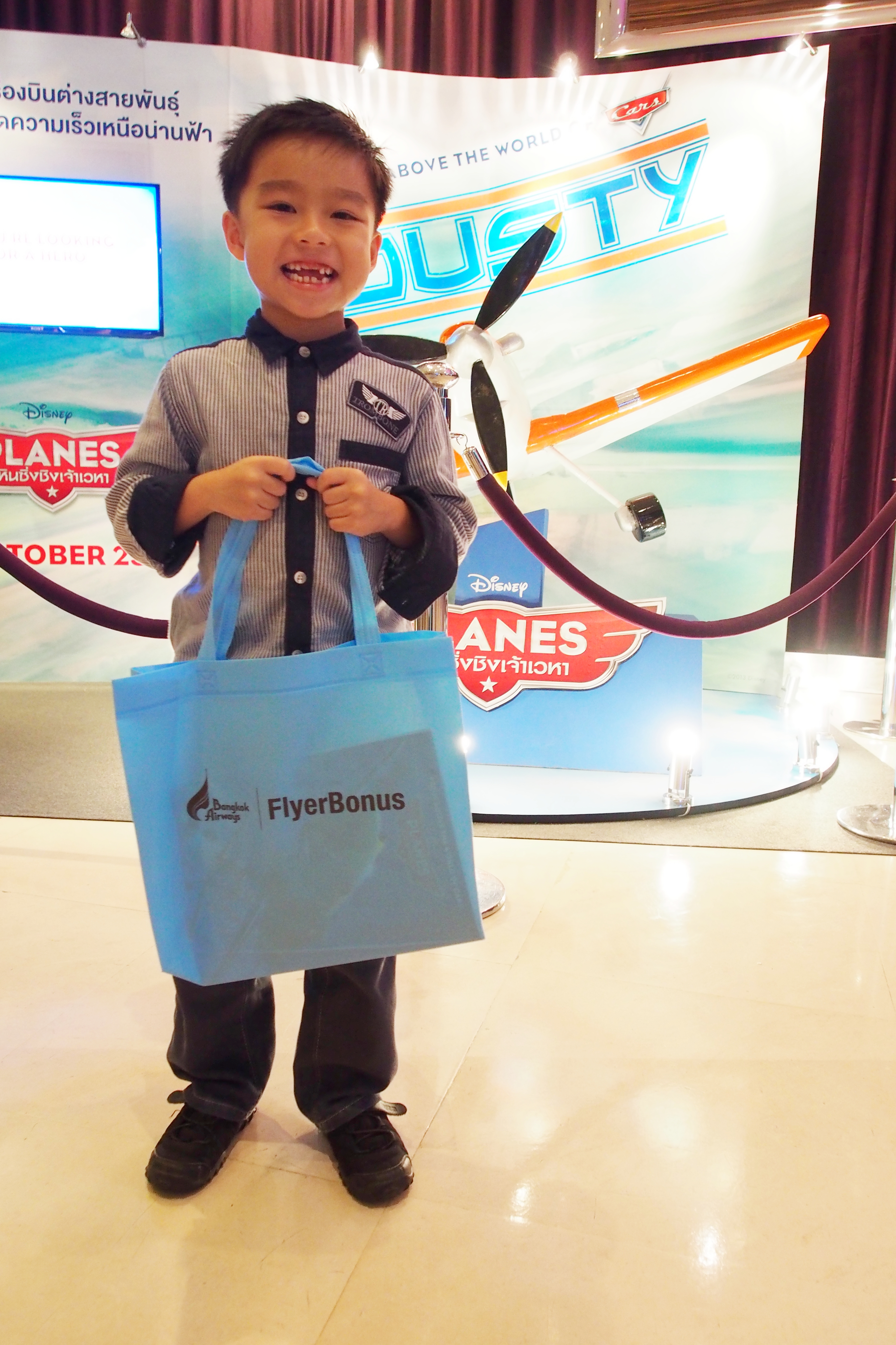 Our little guest is ready to enjoy "Planes" from DisneyToon Studios.